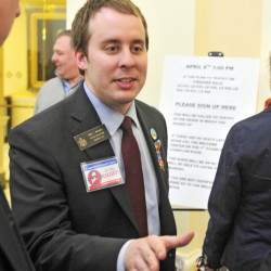 AUGUSTA, ME - APR. 8: Sen. Eric Brakey, R-Auburn, talks to people on the fourth floor before a Criminal Justice and Public Safety committee hearing on several gun bills on Wednesday April 8, 2015 at the State House in Augusta. (Photo by Joe Phelan/Staff Photographer)
