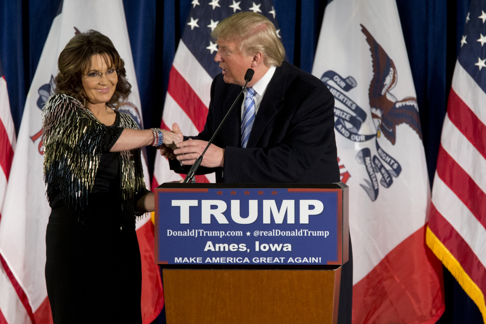 Former Alaska Gov. Sarah Palin endorses Republican presidential candidate Donald Trump on Tuesday during a rally at Iowa State University. "He's going rogue left and right," she told the audience. "That's why he's doing so well."