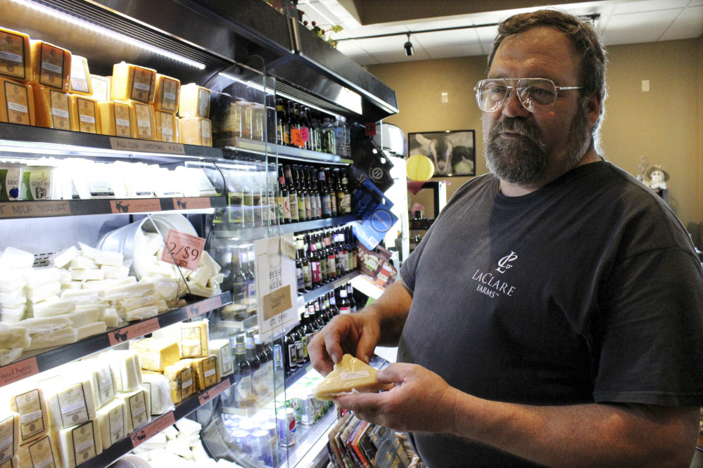 Larry Hedrich holds cheese produced at LaClare Farms. "We're competing in our farm here in Pipe, Wisconsin, with the world," he said. U.S. retail sales of goat cheese reached $142 million this year, up 8 percent from 2015.