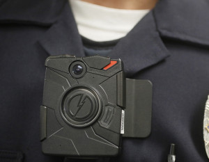 An agreement with Boston's largest police union to have 100 officers wear body cameras is praised as a step toward greater accountability. But with the Sept. 1 rollout date for the pilot program approaching, not a single officer had volunteered to wear one. Damian Dovarganes/Associated Press