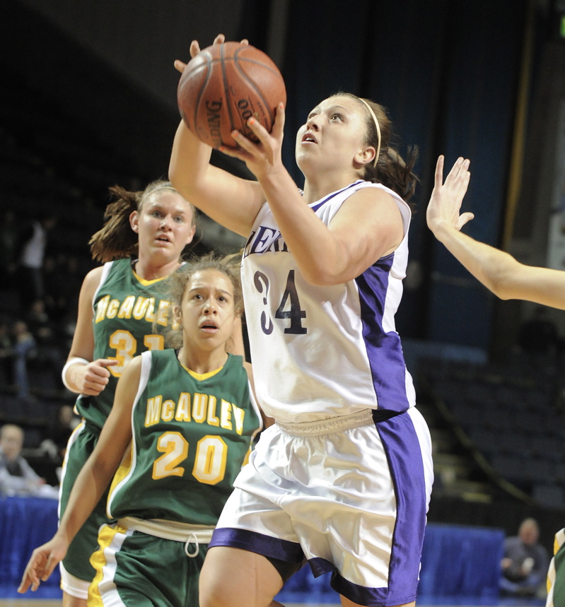 Claire Ramonas of Deering heads to the basket during a 45-35 come-from-behind victory over McAuley in a Western Class A semifinal at the Civic Center.