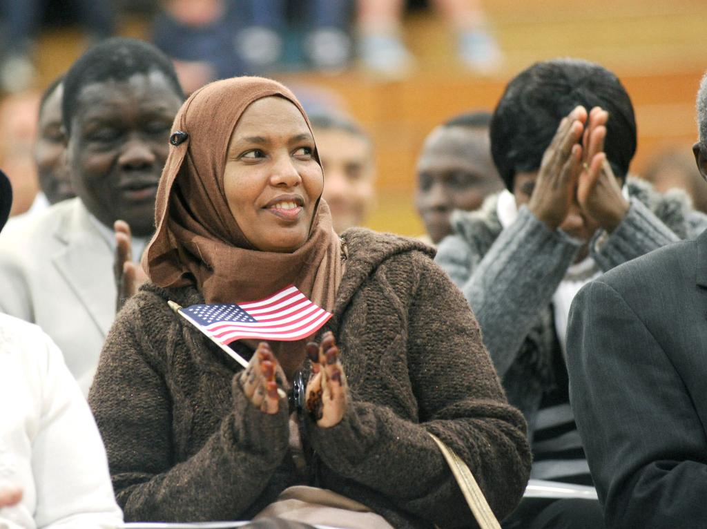 Suad Abrar of Lewiston celebrates her new citizenship Feb. 9 during a ceremony in Falmouth.