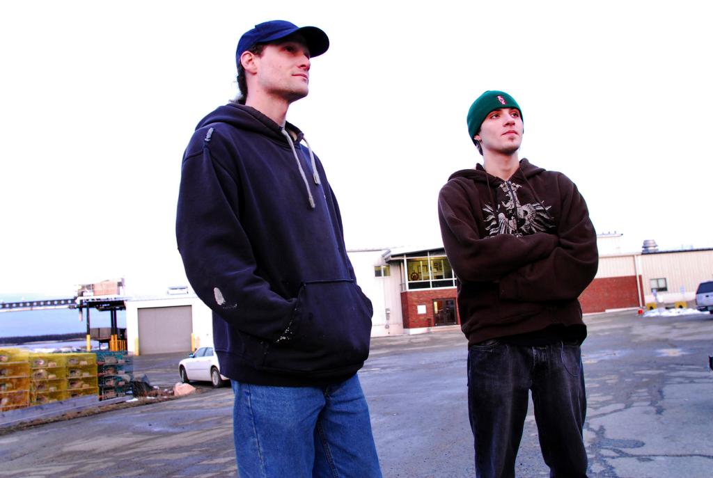 Three full lines go here plz a Eric Deacon, 31, of Corea, left, Anthony Cressler, 19, of Corea, outside of Bumble Bee Foods Stinson Sardine Cannery in Prospect Harbor on February 17, 2010. Both on the clean-up crew at the cannery and are among 130 workers who learned they would be losing their jobs.