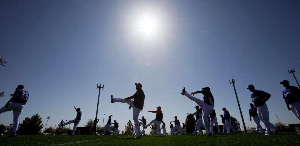 Kansas City Royals players stretch on the team's first day of baseball spring training for pitchers and catchers, Thursday, Feb. 18, 2010, in Surprise, Ariz. (AP Photo/Charlie Neibergall)