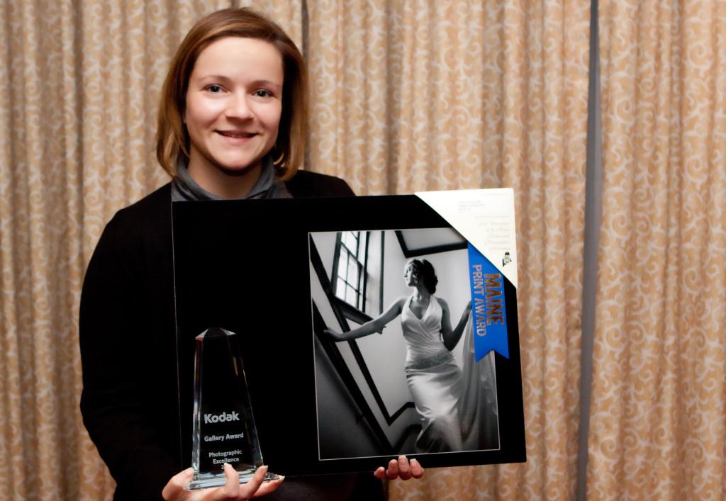 Tiffany Dumas of Georgetown with her Kodak Gallery Award. Dumas is one of five Mainers to win for her work in professional photography.