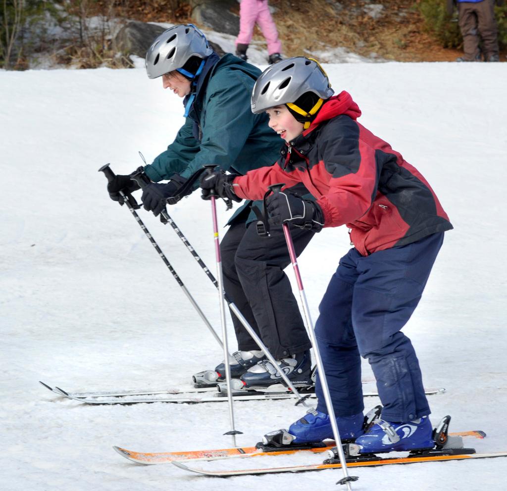 Mom Melanie skis with Peter, 9.