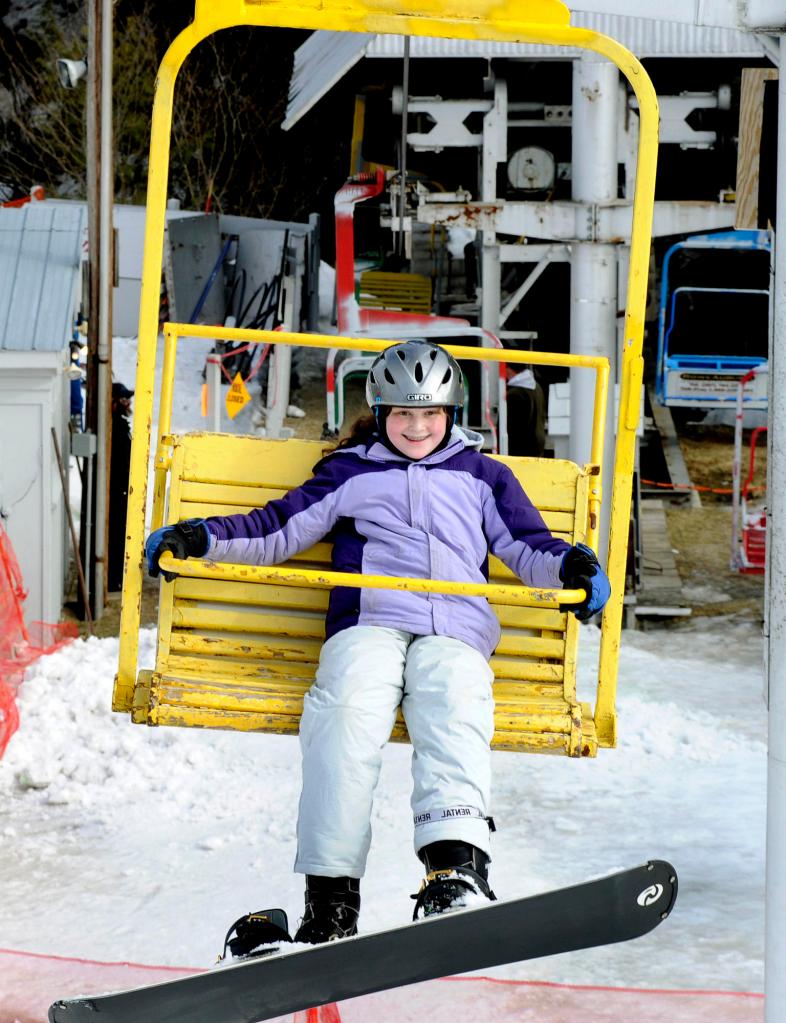 Deidre aces her first ride on a chairlift.