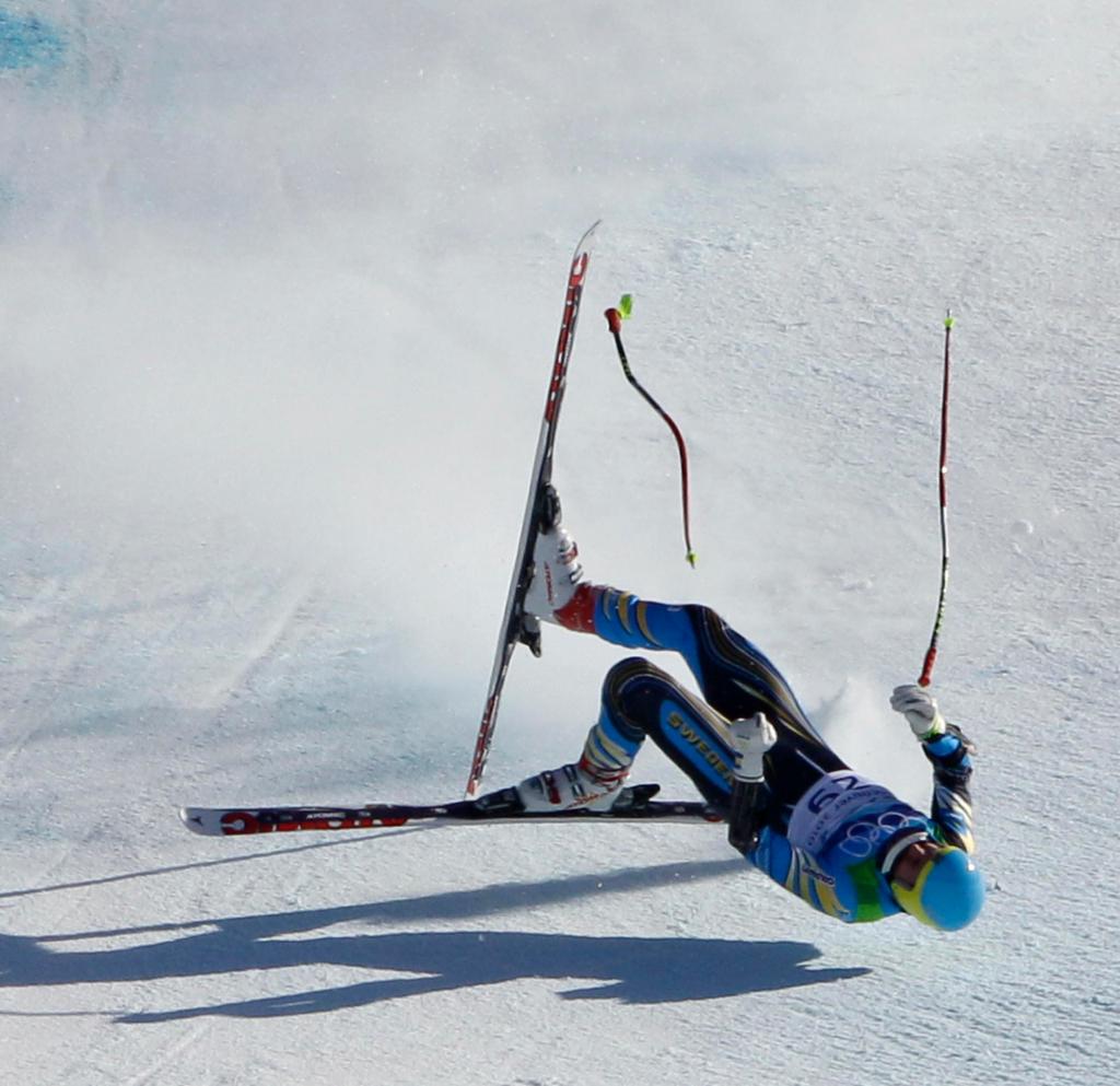 Patrik Jaerbyn, of Sweeden, crashed in the men's super-G event at the Vancouver 2010 Olympics in Whistler, British Columbia, Friday, Feb. 19, 2010. (AP Photo/Charlie Riedel)