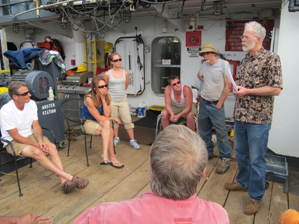 Shipmaster Kevin Garthwaite of Wells speaks with crew members Sunday aboard the Sea Hunter. A final Coast Guard safety inspection is expected this morning.