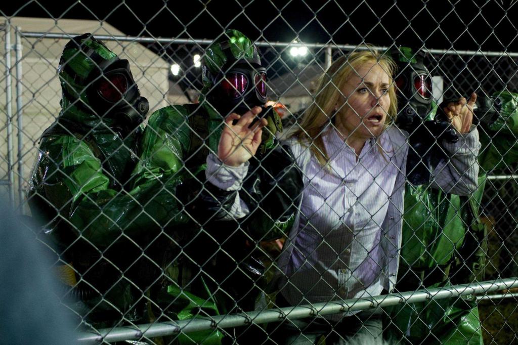 Radha Mitchell stars in “The Crazies,” in which a small town is suddenly plagued by insanity and death after its water supply is mysteriously contaminated.