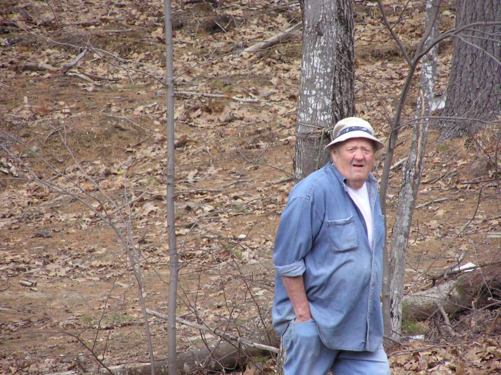 Edgar “Teddy” Dyer walks in the woods, where he would often pick fiddleheads, dandelion greens and pussy willows for those he knew enjoyed them.