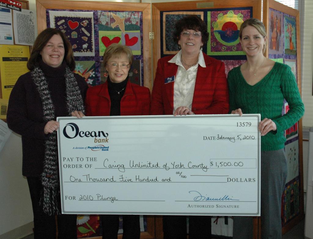 Ocean Bank donated $1,500 to Caring Unlimited of York County in support of its 10th Annual Atlantic Plunge on New Year’s Day. Pictured from left to right are Caring Unlimited Director Cindi Peoples, Ocean Bank executives Sandy Bisson and Mary Matheson, and Caring Unlimited’s Emily Flowers.
