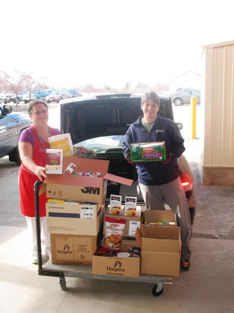 Carol Miller, left, and Lori Stevens helped coordinate a food drive sponsored by staffers at Bridgton Hospital, collecting 500 pounds of goods for a church pantry.