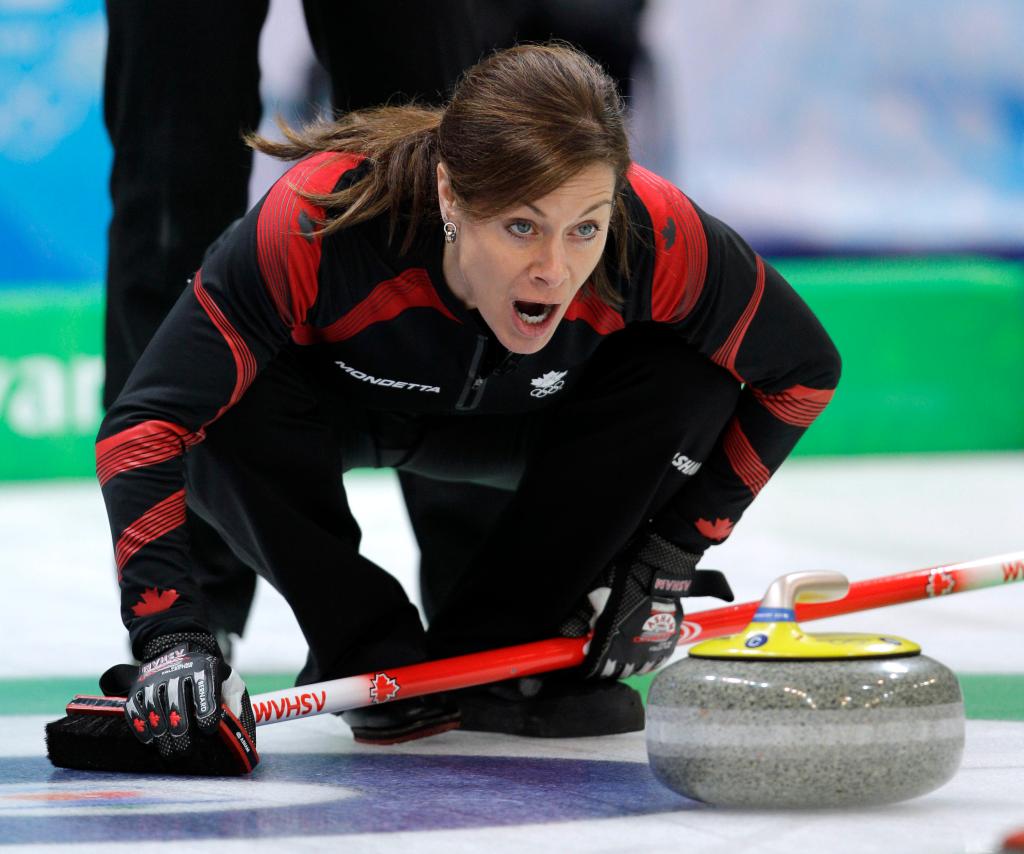 Canada's skip Cheryl Bernard shouts to her sweepers in a semi-final womens curling match against Switzerland at the Vancouver 2010 Olympics in Vancouver, British Columbia, Thursday, Feb. 25, 2010. (AP Photo/Robert F. Bukaty)