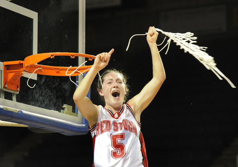 Brittany Ross twirls the net during Scarborough's victory celebration.