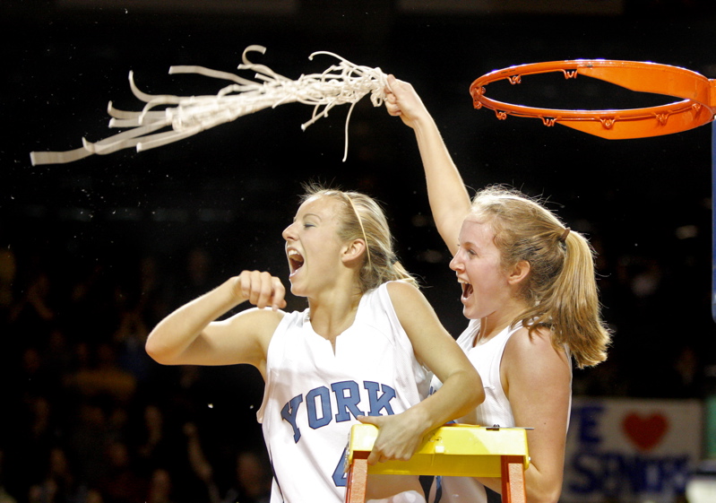 Stephanie Gallagher, left, and Emma Clark celebrate York’s second straight regional title. The Wildcats will play Nokomis for the state championship on Friday in Bangor.