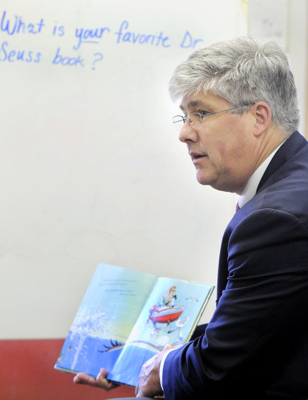 Portland Mayor Nicholas Mavodones reads to pupils at Hall School as part of Read Across America Day on Tuesday.