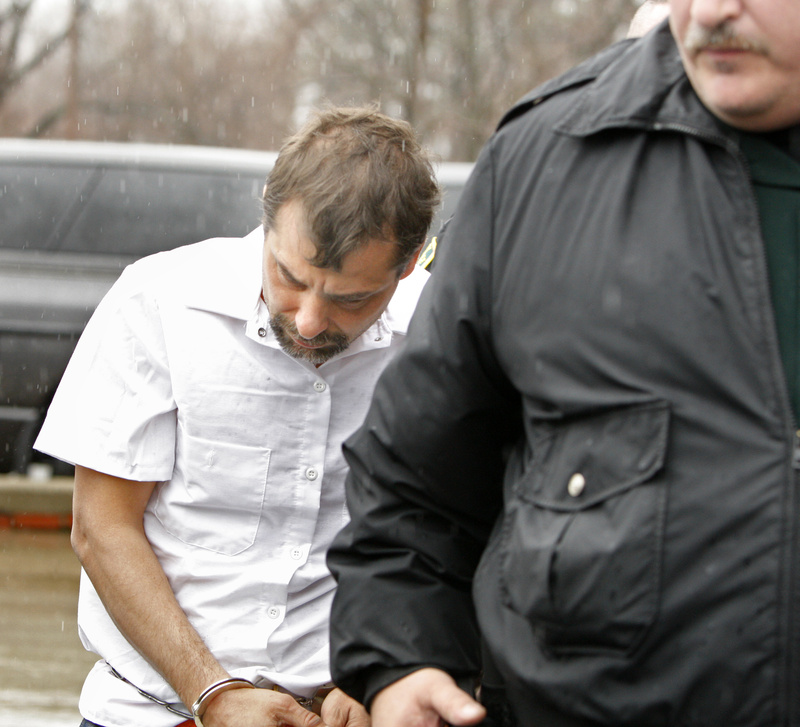 Patrick Dapolito, charged with murdering his wife at their Limington home, is led from court Monday in Alfred.