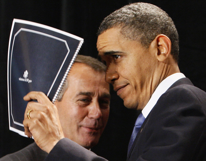 Obama holds up a document of Republican solutions given to him by House Minority Leader John Boehner of Ohio before speaking to Republican lawmakers at the GOP House Issues Conference in Baltimore. Joking, Obama said some things are more important than high poll numbers "and on this, no one can accuse me of not living by my principles."