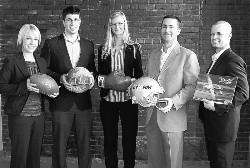 The teamat Shamrock Sports Group, a sports marketing firm on Commercial Street in Portland, includes, from left, Jennilee Keef, Matthew Burgess, Diana Arnold, Brian Corcoran and Court Barnett.