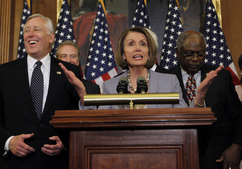 House Speaker Nancy Pelosi, D-Calif., addresses a news conference after the House passed health care reform in the U.S. Capitol in Washington late Sunday night. Standing with Pelosi are Majority Leader Steny Hoyer of Maryland, left, and Rep. James Clyburn, D-S.C. The bill gives a badly needed boost to President Obama’s young presidency.