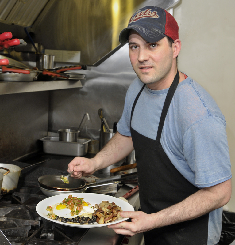 Keith Voight, owner/chef of Mousse Cafe and Bakeshop, makes a morning favorite, huevos rancheros.