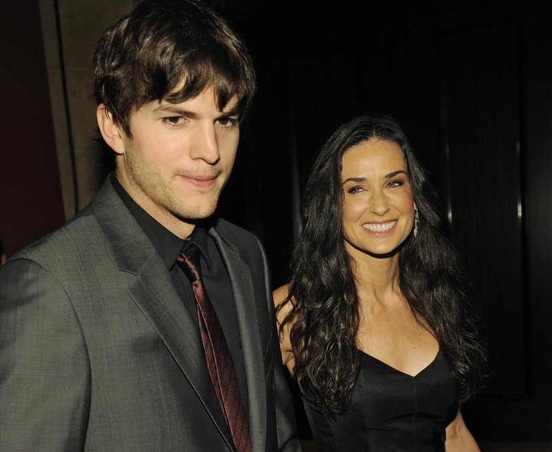 Demi Moore, pictured with husband Ashton Kutcher Thursday. Moore's Twitter account was linked to a chain of posts that led police to a man threatening to commit suicide.