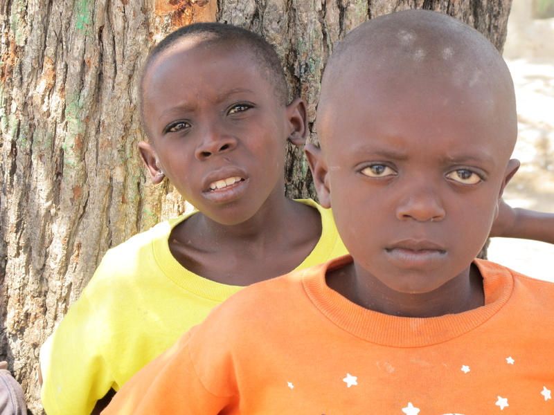 Douyon Roberson, left, and Phillipe Juste are two of the almost 800 orphans living at Hope Village.