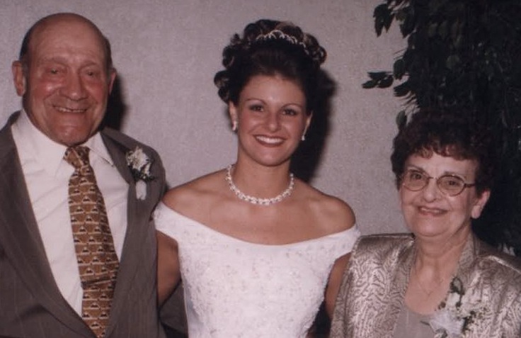 Domenic Mazziotti, with his wife Phyllis, at right, and their granddaughter Erica at her wedding.