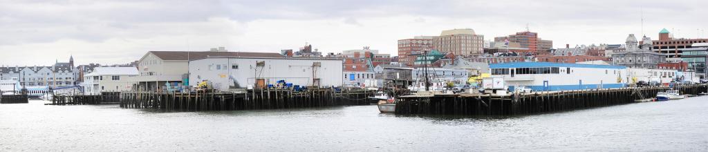 Piers on the Portland waterfront are seen in a composite photo. A forum tonight will focus on economic conditions, and another on Thursday will outline potential zoning changes.