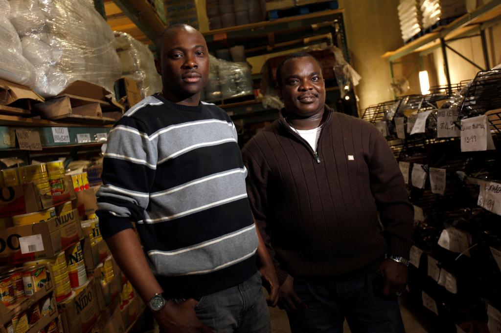 Charles Chiefredo and Adebayo Mafe own BCS African Wholesale Food Supply in Brooklyn Park, Minn. The import company was able to obtain a $67,000 loan from the nonprofit Metropolitan Economic Development Association.