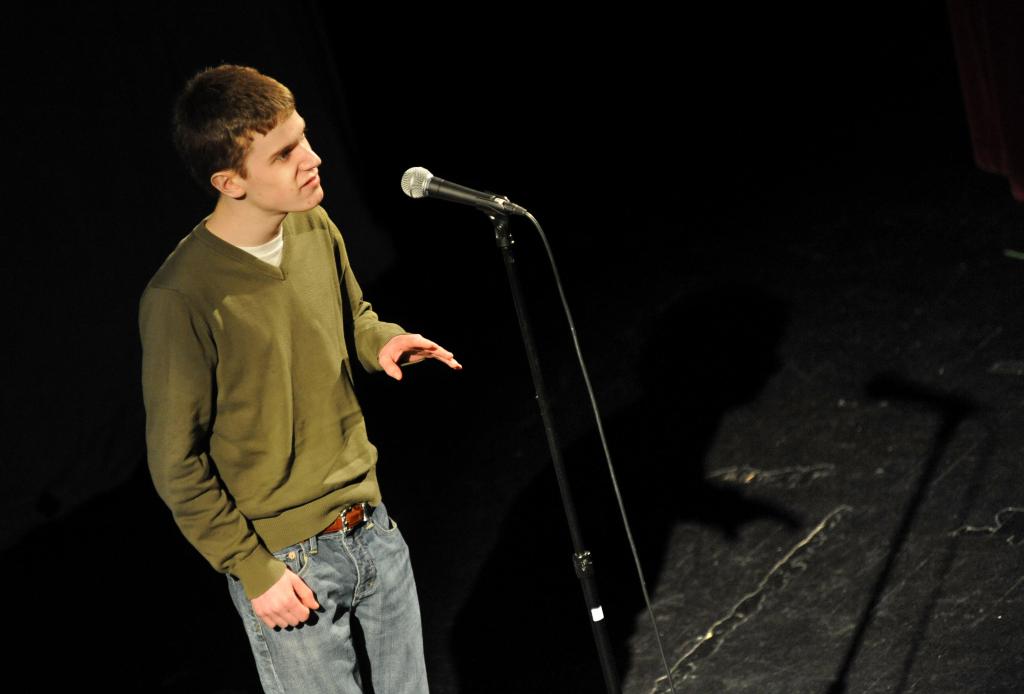Aaron Bartlett, a senior at Gorham High School, performs “La Figlia che Piange” by T.S. Eliot during the first of three rounds at the Poetry Out Loud state finals Friday evening at the Waterville Opera House. Champion Will Whitham, a Bangor High senior, will go to Washington D.C. for the national finals in April.