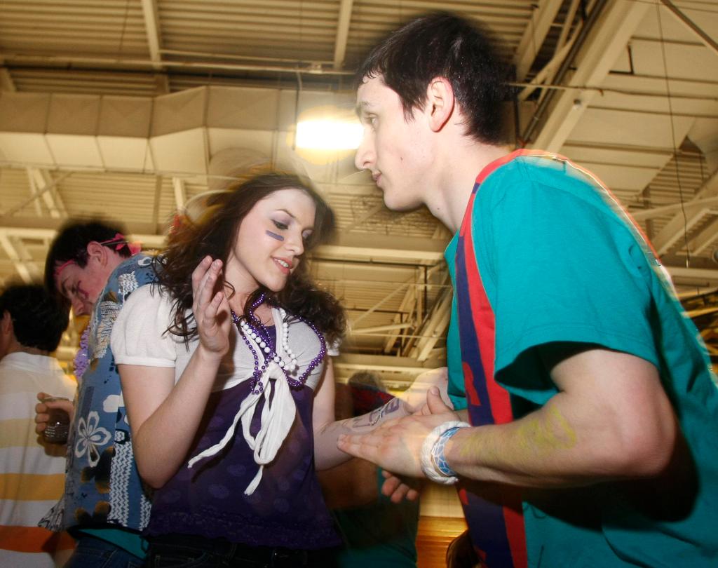 Caitlin Very and Arjan Nekoie, both Deering High School students, move to one of the final songs Sunday after dancing all night at USM’s Sullivan Gymnasium in Portland at the 6th annual Dance Marathon to raise funds for STRIVE programs.