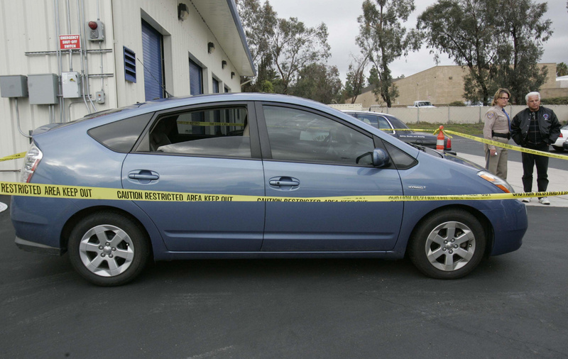 James Sikes’ Prius sits at the dealership where he bought it, waiting for investigatorsto arrive Tuesday.