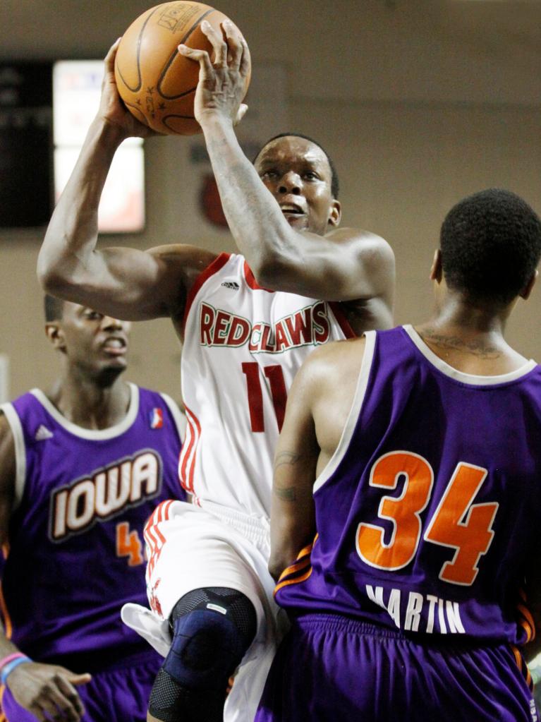Russell Robinson of the Red Claws splits the Iowa defense on a drive to the basket Sunday night at the Portland Expo. The Energy got double-digit scoring from all five starters and cruised to a win.