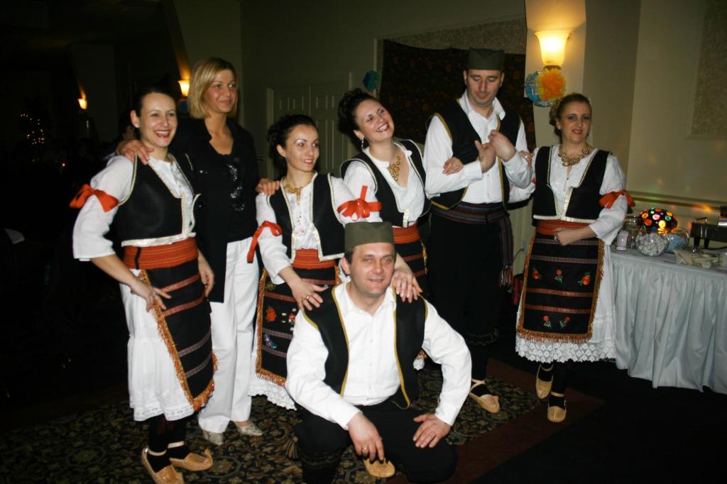 Members of the Serbian dance troupe Kud Sokolica pose for the cameras.