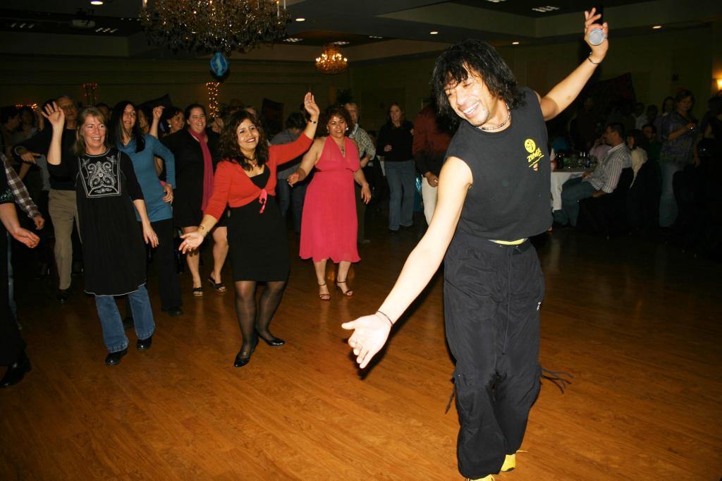 Tony Garreton (known as Tony Zumba) demonstrates Latin dance moves.