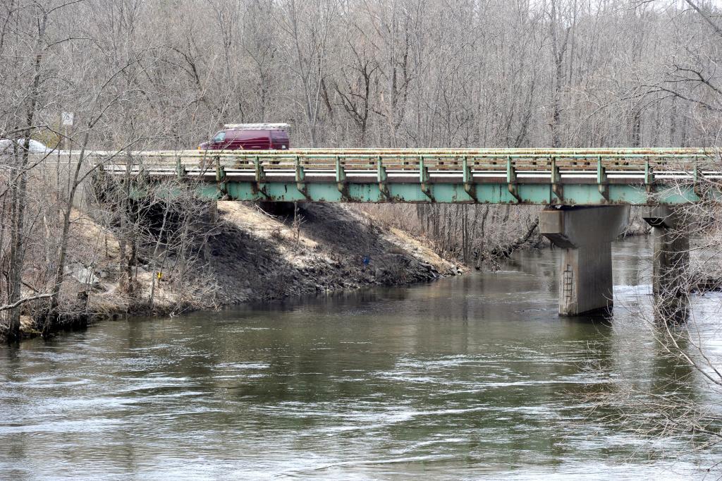 The Maine Turnpike Authority plans to rebuild this bridge over the Presumpscot River, starting in May, and will cut into the slope under the bridge to build a footpath. The improvement removes a barrier to an effort to create a trail from Sebago Lake to Casco Bay by weaving together existing trails and new ones.