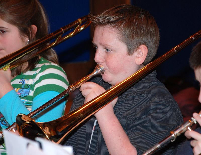 Saco Middle School band student Jeffrey Foran plays trombone during an honors band and chorus concert performed by area Grade 6 musicians and singers at Old Orchard Beach.