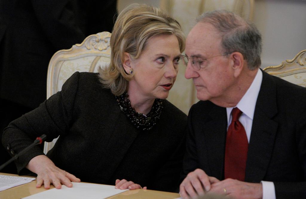 U.S. Secretary of State Hillary Rodham Clinton speaks with U.S. special envoy for Mideast peace George Mitchell during talks in Moscow on Friday with the Quartet of Middle East peace mediators. Mitchell will be in Israel Sunday to meet with the prime minister.