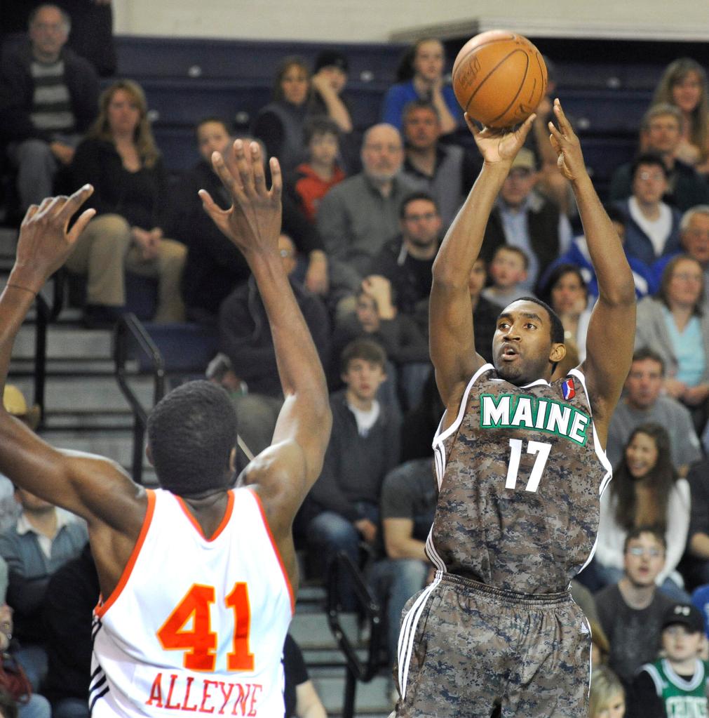 Darnell Lazare of the Maine Red Claws finds room to shoot over Shagari Alleyne of Albuquerque. The Red Claws won and remain fifth in the D-League overall standings.