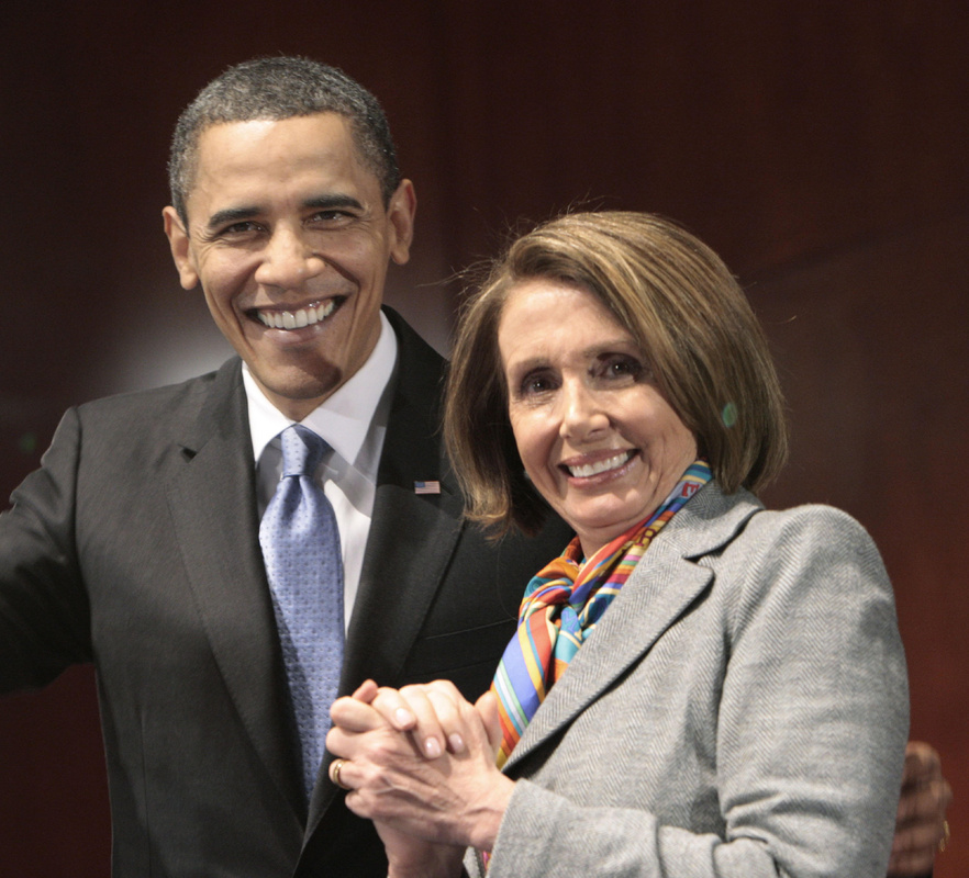 President Obama stands with House Speaker Nancy Pelosi, D-Calif., during his visit to Capitol Hill to meet with House Democrats on Saturday to promote health care reform.