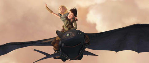 Astrid (voiced by America Ferrera) and Hiccup (voiced by Jay Baruchel) soar on the wings of Toothless in the animated adventure, “How to Train Your Dragon.”