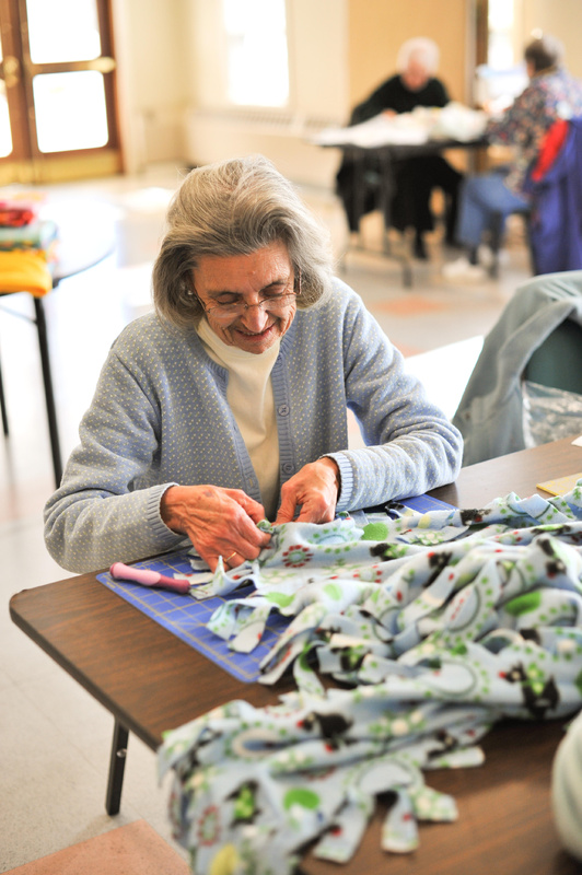 Nina Minnehan works on a fleece blanket a recent Blanket Day for the Cumberland County chapter of Project Linus.