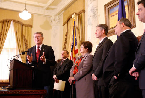 Republican Gov. C.L. “Butch” Otter of Idaho speaks Tuesday about the state’s decision to sue the U.S. government over health care reform legislation. Attorneys general from 13 states sued the federal government Tuesday, claiming the landmark health care overhaul is unconstitutional, and Republicans in Congress may try to repeal the legislation.