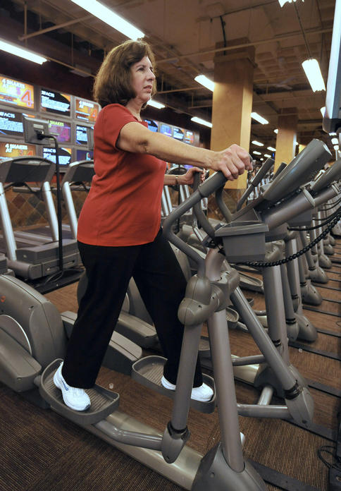 Janet Katzin, 61, uses an elliptical machine at the X-Sport gym in Garden City, N.Y. “I know I should go more, but that’s all I can swing,” said Katzin, who exercises there for two hours a week.