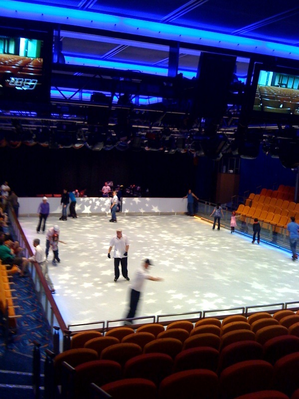 The skating rink is used by passengers during the day and for shows at night.