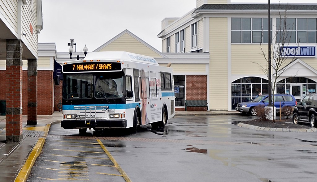 The Metro bus arrives during a rainy afternoon at Shaw’s supermarket in the Falmouth Shopping Center, after its previous stop at the Falmouth Walmart. Town officials are studying ways to improve ridership, or they will be forced to discontinue it.