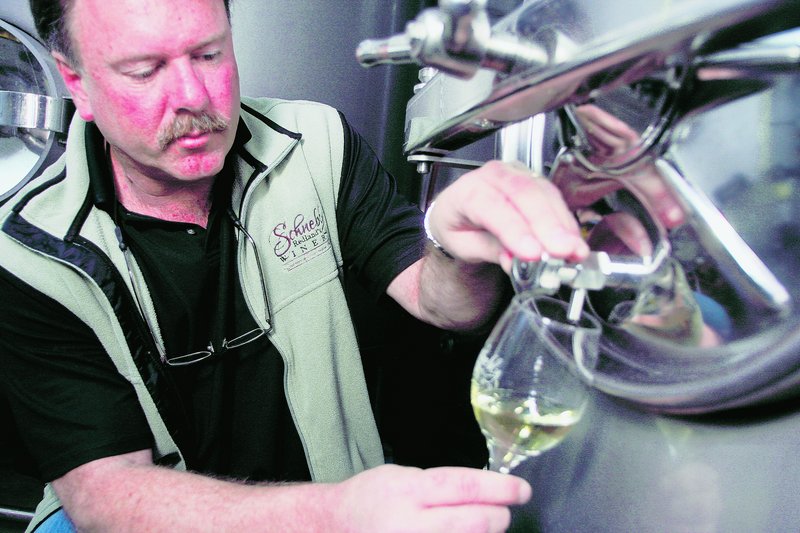 Peter Schnebly, co-owner of Schnebly Redland’s Winery, takes a taste of its lychee wine. Miami-Dade County officials recently loosened restrictions on small-scale commercial ventures within farms to spur tourism.