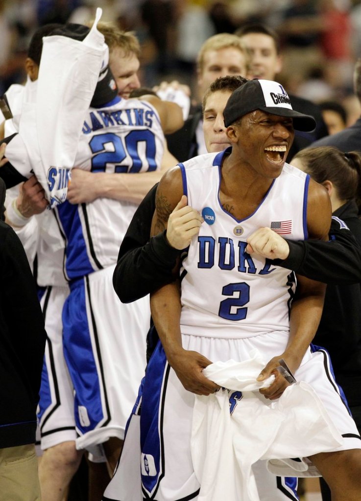 Nolan Smith leads the Duke celebration Sunday after a 78-71 win against Baylor in the NCAA South Regional final at Houston. The Blue Devils advanced to the Final Four for the first time in six years.